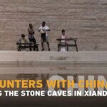 ____African_Scholars_Rock_Xiandu_s_Stone_Caves_in_Cultural_Fusion_Concert_ video poster