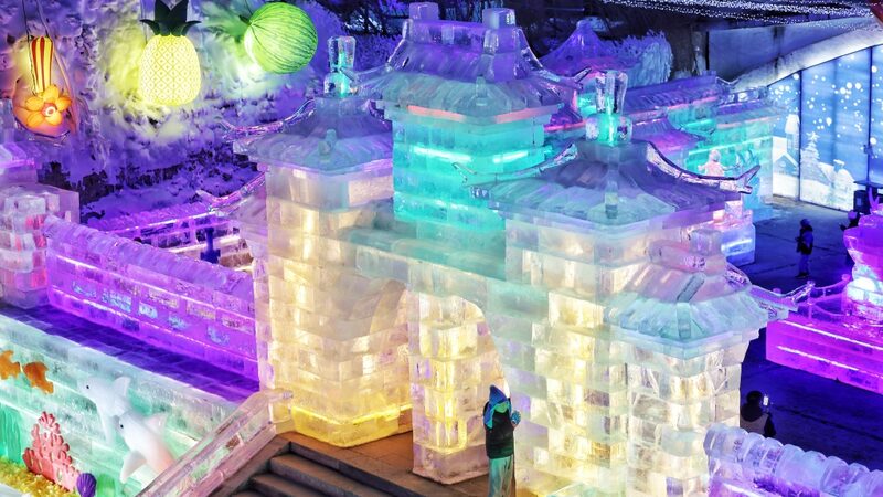 Beijing_s_Ice_Festival_Lights_Up_Winter_Nights_with_300__Sculptures___Drone_Magic__ - 🌍NewspaperAmigo – Your Global News Buddy 🗞️ ___Beijing_s_Ice_Festival_Lights_Up_Winter_Nights_with_300__Sculptures___Drone_Magic__
