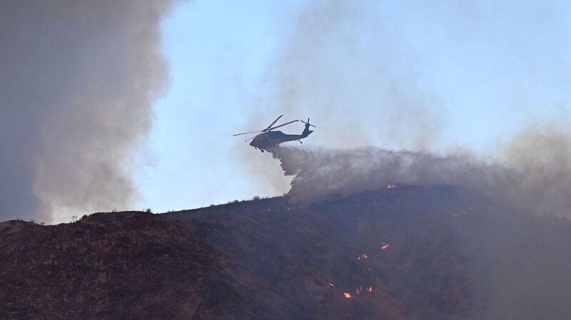 Breaking__Wildfire_Spreads_Rapidly_in_Los_Angeles - 🌍NewspaperAmigo – Your Global News Buddy 🗞️ _Breaking__Wildfire_Spreads_Rapidly_in_Los_Angeles