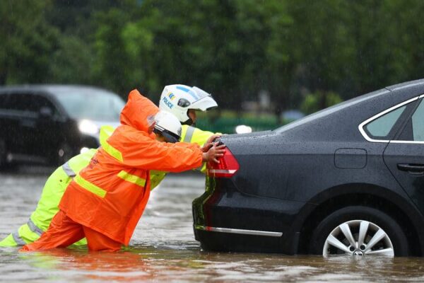China Boosts Flood Response Amid Red Alert for Record Rainstorms 🌧️🚨 China_Boosts_Flood_Response_Amid_Red_Alert_for_Record_Rainstorms____