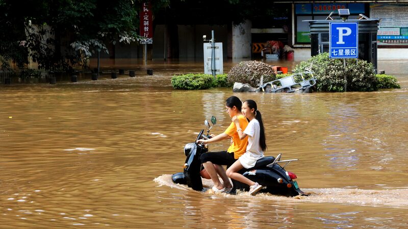 China_Pumps__14_7M_into_Flood_Hit_Roads____ - 🌍NewspaperAmigo – Your Global News Buddy 🗞️ China_Pumps__14_7M_into_Flood_Hit_Roads____