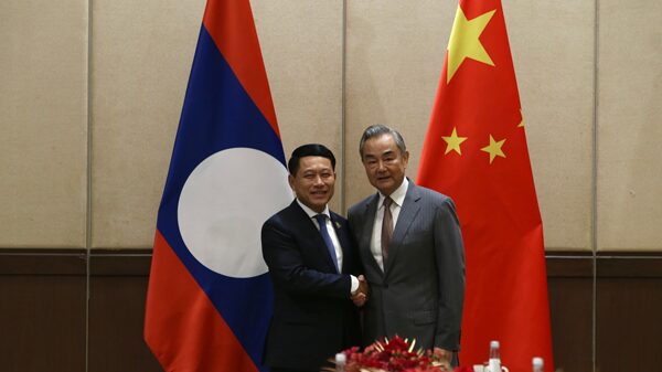China___Laos_Boost_Ties_with_Rail_Power___ASEAN_Unity___