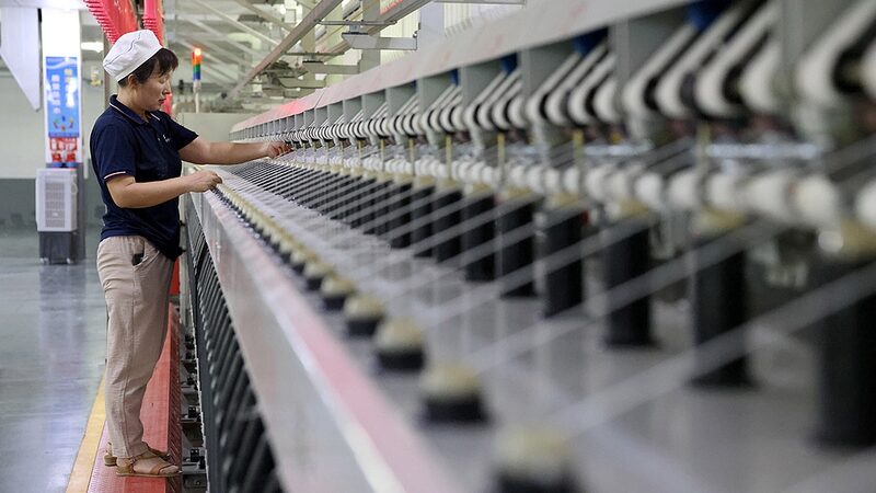China_s_5G_Factory_Boom__10_000_Smart_Plants_by_2027___ - 🌍NewspaperAmigo – Your Global News Buddy 🗞️ China_s_5G_Factory_Boom__10_000_Smart_Plants_by_2027___