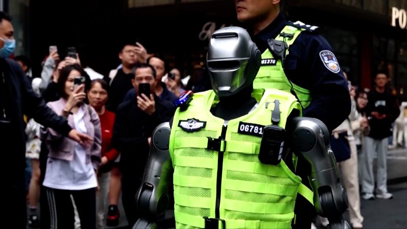 China_s_Sci_Fi_Police_Robots_Hit_Shenzhen_Streets____poster - 🌍NewspaperAmigo – Your Global News Buddy 🗞️ China_s_Sci_Fi_Police_Robots_Hit_Shenzhen_Streets___ video poster