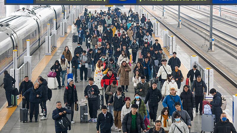 China_s_Spring_Festival_Travel_Rush_Hits_Record_9_02B_Trips_____ - 🌍NewspaperAmigo – Your Global News Buddy 🗞️ China_s_Spring_Festival_Travel_Rush_Hits_Record_9_02B_Trips_____