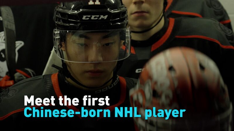 Chinese_Born_Teen_Skates_Toward_NHL_History___poster - 🌍NewspaperAmigo – Your Global News Buddy 🗞️ __Chinese_Born_Teen_Skates_Toward_NHL_History__ video poster