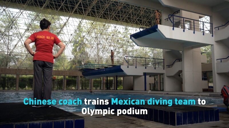 Chinese_Coach_Helps_Mexico_Dive_to_Olympic_Glory___poster - 🌍NewspaperAmigo – Your Global News Buddy 🗞️ Chinese_Coach_Helps_Mexico_Dive_to_Olympic_Glory__ video poster