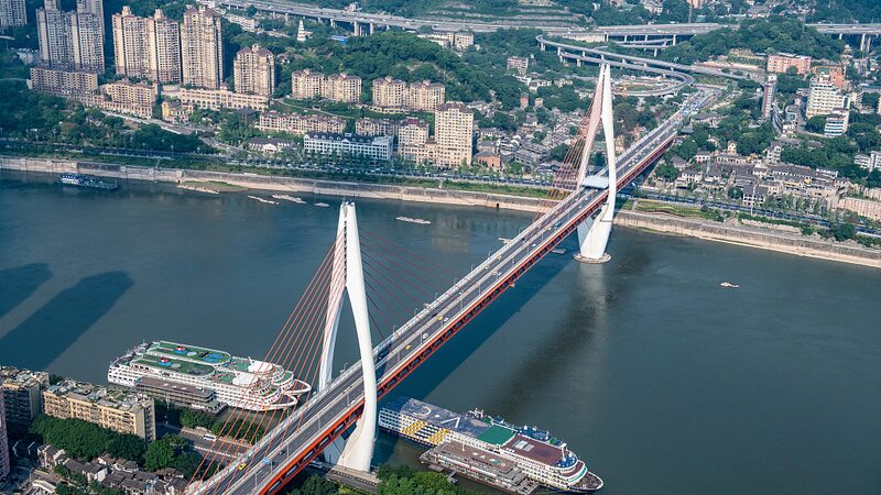 Chongqing_s_Dongshuimen_Bridge__A_Marvel_on_the_Yangtze_River____poster - 🌍NewspaperAmigo – Your Global News Buddy 🗞️ Chongqing_s_Dongshuimen_Bridge__A_Marvel_on_the_Yangtze_River___ video poster