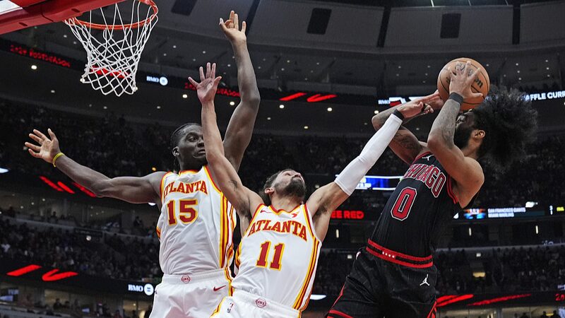 Coby_White_s_Career_Night_Powers_Bulls_Past_Hawks_in_Play_In_Thriller___ - 🌍NewspaperAmigo – Your Global News Buddy 🗞️ Coby_White_s_Career_Night_Powers_Bulls_Past_Hawks_in_Play_In_Thriller___