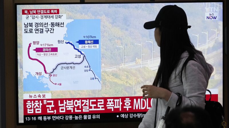 DPRK_Destroys_Inter_Korean_Roads_Amid_Rising_Tensions - 🌍NewspaperAmigo – Your Global News Buddy 🗞️ DPRK_Destroys_Inter_Korean_Roads_Amid_Rising_Tensions