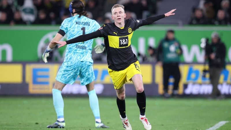Dortmund_Dominate_with_3_Goal_Blitz__Enter_Bundesliga_Top_Six___ - 🌍NewspaperAmigo – Your Global News Buddy 🗞️ Dortmund_Dominate_with_3_Goal_Blitz__Enter_Bundesliga_Top_Six___