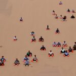 Experience_the_Thrill_of_Sand_Sliding_in_Gansu_s_Dunhuang_ video poster