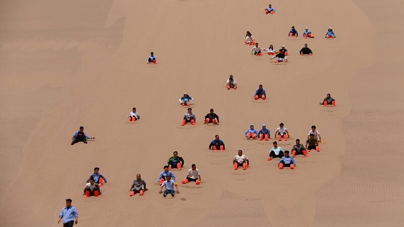 Experience_the_Thrill_of_Sand_Sliding_in_Gansu_s_Dunhuang__poster - 🌍NewspaperAmigo – Your Global News Buddy 🗞️ Experience_the_Thrill_of_Sand_Sliding_in_Gansu_s_Dunhuang_ video poster