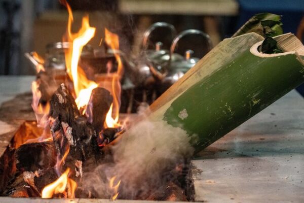 Flaming_Bamboo_Tube_Chicken_Rice__Yunnan_s_Fiery_Culinary_Tradition___ - 🌍NewspaperAmigo – Your Global News Buddy 🗞️ Flaming_Bamboo_Tube_Chicken_Rice__Yunnan_s_Fiery_Culinary_Tradition___