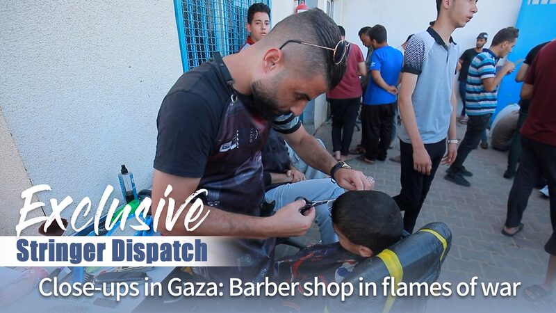 Gaza_Barber_Shop_Offers_Hope_Amid_War_s_Chaos_____poster - 🌍NewspaperAmigo – Your Global News Buddy 🗞️ __Gaza_Barber_Shop_Offers_Hope_Amid_War_s_Chaos____ video poster