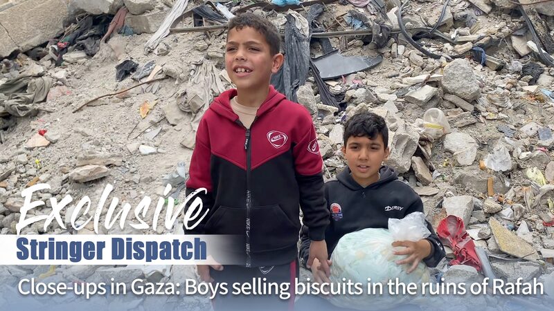 Gaza_Boys_Sell_Biscuits_Amid_Ruins_to_Survive_Winter_____poster - 🌍NewspaperAmigo – Your Global News Buddy 🗞️ Gaza_Boys_Sell_Biscuits_Amid_Ruins_to_Survive_Winter____ video poster
