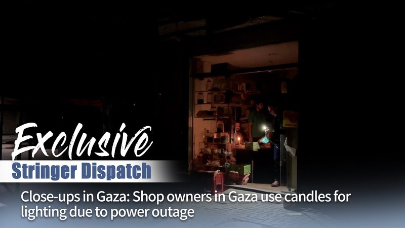 Gaza_Shops_Turn_to_Candles_Amid_Power_Crisis___ video poster