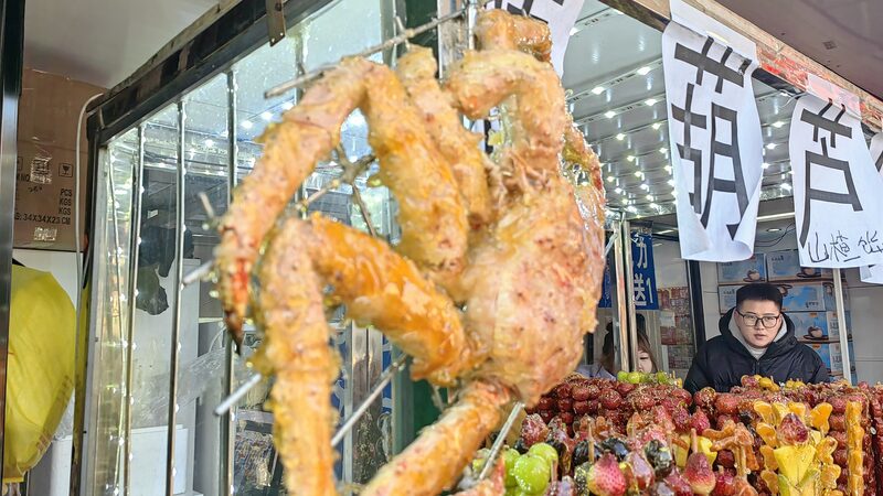 Harbin_s_Craziest_Snack__Tanghulu_Gets_a_Seafood_Twist____ - 🌍NewspaperAmigo – Your Global News Buddy 🗞️ Harbin_s_Craziest_Snack__Tanghulu_Gets_a_Seafood_Twist____
