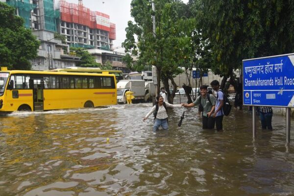 Heavy Rains in Mumbai Lead to School Closures and Exam Postponements 🌧️📚 Heavy_Rains_in_Mumbai_Lead_to_School_Closures_and_Exam_Postponements____
