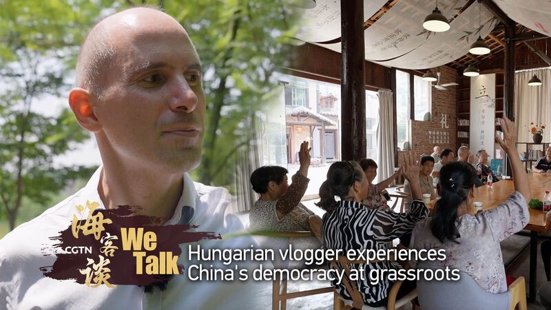 Hungarian_Vlogger_Explores_China_s_Grassroots_Democracy_____poster - 🌍NewspaperAmigo – Your Global News Buddy 🗞️ Hungarian_Vlogger_Explores_China_s_Grassroots_Democracy____ video poster