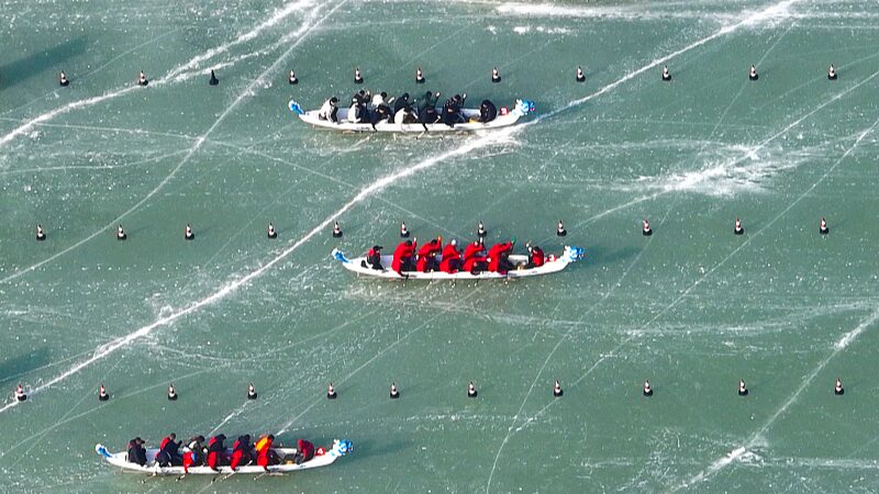 Ice_Dragon_Boats_Race_in_Yinchuan_Spark_Winter_Sports_Craze____ - 🌍NewspaperAmigo – Your Global News Buddy 🗞️ Ice_Dragon_Boats_Race_in_Yinchuan_Spark_Winter_Sports_Craze____
