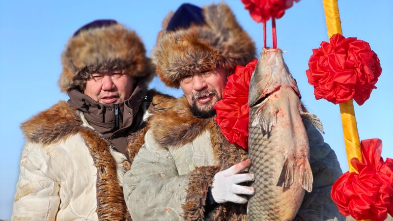 Ice___Bites__Xinjiang_s_Winter_Fishing_Festival_Reels_In_Tradition____