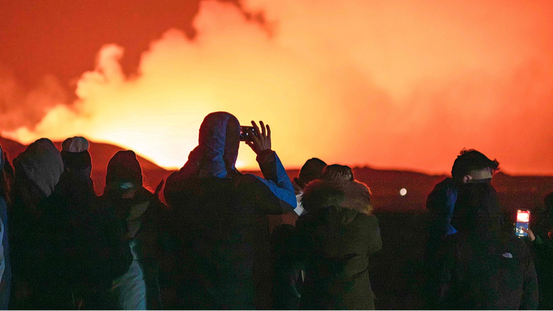 Iceland_s_Volcanic_Fury_Eases____Defenses_Hold_Strong_ - 🌍NewspaperAmigo – Your Global News Buddy 🗞️ Iceland_s_Volcanic_Fury_Eases____Defenses_Hold_Strong_