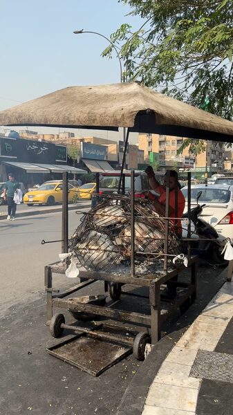 Iraq_s_Ancient_Fish_Dish_Still_Sizzles_in_Baghdad_Streets____poster - 🌍NewspaperAmigo – Your Global News Buddy 🗞️ Iraq_s_Ancient_Fish_Dish_Still_Sizzles_in_Baghdad_Streets___ video poster
