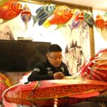 Master_Craftsman_Creates_Vibrant_Fish_Lanterns_for_Spring_Festival___