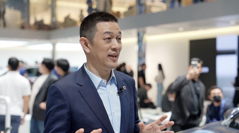 NIO_CEO__EV_Charging_vs__Battery_Swapping___Two_Roads_to_Green_Mobility____poster - 🌍NewspaperAmigo – Your Global News Buddy 🗞️ NIO_CEO__EV_Charging_vs__Battery_Swapping___Two_Roads_to_Green_Mobility___ video poster