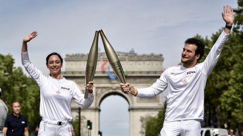 Paris_2024_Olympic_Torch_Unveiled__Waves_of_Unity___ - 🌍NewspaperAmigo – Your Global News Buddy 🗞️ Paris_2024_Olympic_Torch_Unveiled__Waves_of_Unity___