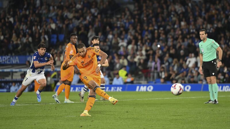 Real_Madrid_Edges_Real_Sociedad_2_0_in_Nail_Biting_La_Liga_Clash___ - 🌍NewspaperAmigo – Your Global News Buddy 🗞️ Real_Madrid_Edges_Real_Sociedad_2_0_in_Nail_Biting_La_Liga_Clash___