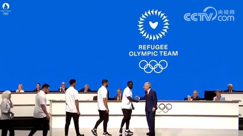 Refugee_Athletes_Shine_at_Paris_Olympics___ - 🌍NewspaperAmigo – Your Global News Buddy 🗞️ Refugee_Athletes_Shine_at_Paris_Olympics___