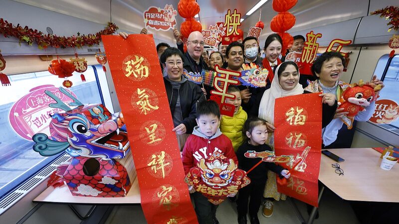 Saxophone___Festivities__Train_Crew_Celebrates_Kitchen_God_Day_in_Style_ - 🌍NewspaperAmigo – Your Global News Buddy 🗞️ __Saxophone___Festivities__Train_Crew_Celebrates_Kitchen_God_Day_in_Style_