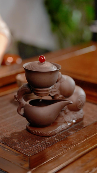 Self_Pouring_Purple_Clay_Teapot_Blends_Tradition___Tech____poster - 🌍NewspaperAmigo – Your Global News Buddy 🗞️ Self_Pouring_Purple_Clay_Teapot_Blends_Tradition___Tech___ video poster