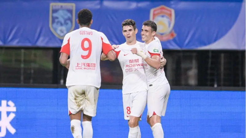 Shanghai_Port_Takes_CSL_Lead_in_Thrilling_Rescheduled_Match___ - 🌍NewspaperAmigo – Your Global News Buddy 🗞️ Shanghai_Port_Takes_CSL_Lead_in_Thrilling_Rescheduled_Match___