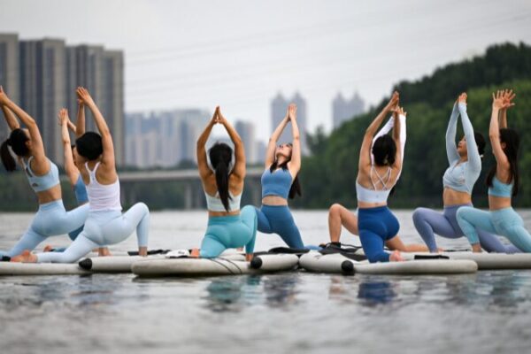 Shenyang Yoga Teachers Master Paddleboard Poses on Hunhe River 🌊🧘♀️ Shenyang_Yoga_Teachers_Master_Paddleboard_Poses_on_Hunhe_River_____