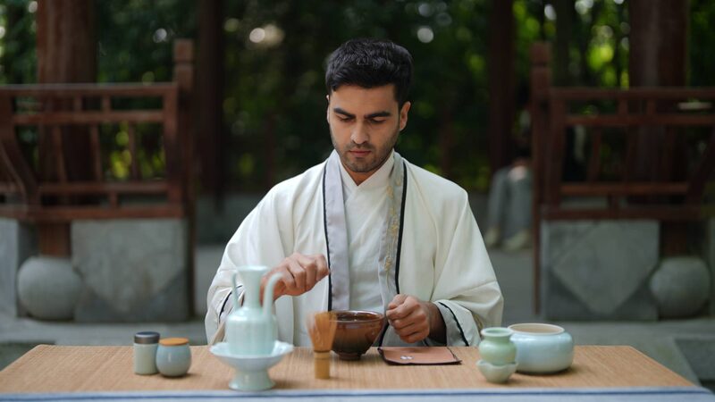 Tajik_Tea_Master_Brews_Gold_with_Ancient_Song_Dynasty_Art____poster - 🌍NewspaperAmigo – Your Global News Buddy 🗞️ Tajik_Tea_Master_Brews_Gold_with_Ancient_Song_Dynasty_Art___ video poster