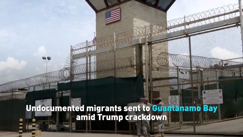 Thousands_of_Migrants_Sent_to_Guantanamo_Bay_in_Trump_s_Immigration_Push_poster - 🌍NewspaperAmigo – Your Global News Buddy 🗞️ Thousands_of_Migrants_Sent_to_Guantanamo_Bay_in_Trump_s_Immigration_Push video poster