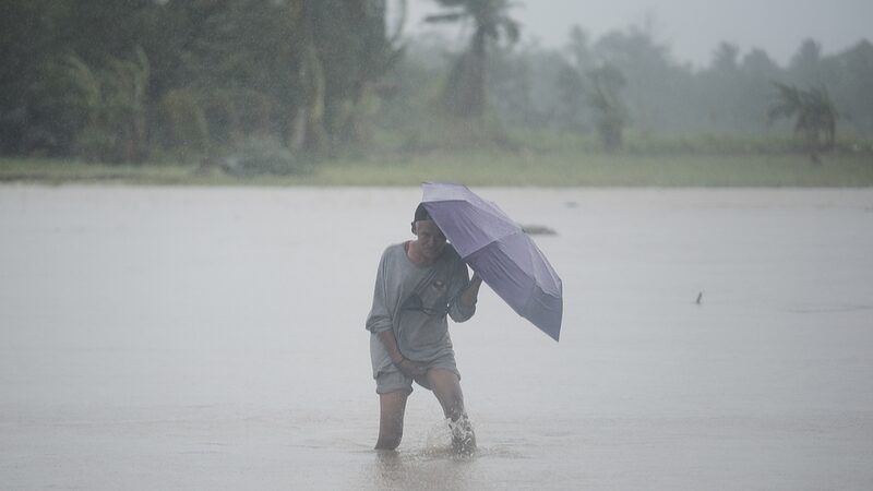 Tropical_Storm_Trami_Hits_Philippines__26_Dead__150_000_Flee_Homes - 🌍NewspaperAmigo – Your Global News Buddy 🗞️ Tropical_Storm_Trami_Hits_Philippines__26_Dead__150_000_Flee_Homes
