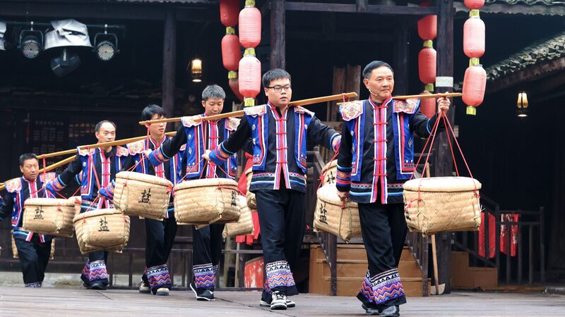 Tujia_Ethnic_Performances_Delight_Visitors_in_Chongqing__ - 🌍NewspaperAmigo – Your Global News Buddy 🗞️ Tujia_Ethnic_Performances_Delight_Visitors_in_Chongqing__