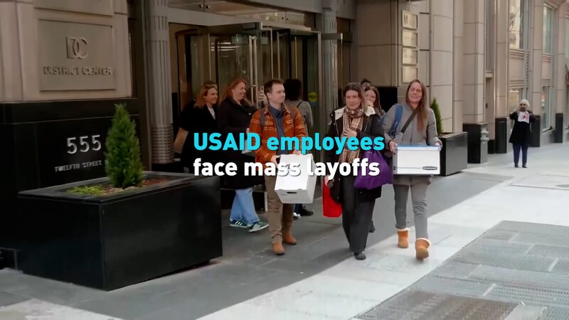 USAID_Faces_Mass_Layoffs__1_600_Jobs_Cut_Amid_Agency_Overhaul_poster - 🌍NewspaperAmigo – Your Global News Buddy 🗞️ USAID_Faces_Mass_Layoffs__1_600_Jobs_Cut_Amid_Agency_Overhaul video poster