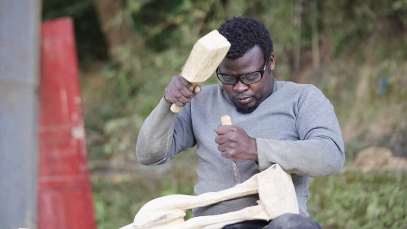 Ugandan_Artist_Carves_Cultural_Bridges_in_China______poster - 🌍NewspaperAmigo – Your Global News Buddy 🗞️ Ugandan_Artist_Carves_Cultural_Bridges_in_China_____ video poster