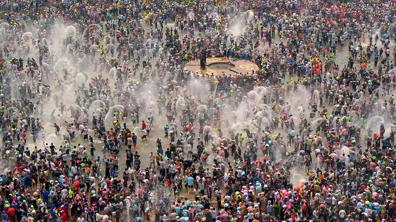 Yunnan_s_Water_Splashing_Festival__Joy__Lanterns__and_Cultural_Pride____poster - 🌍NewspaperAmigo – Your Global News Buddy 🗞️ Yunnan_s_Water_Splashing_Festival__Joy__Lanterns__and_Cultural_Pride___ video poster