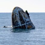 A11RT4L274A87E6EL15E - 🌍NewspaperAmigo – Your Global News Buddy 🗞️ Dolphins Greet SpaceX Dragon Capsule After Historic Splashdown 🌊🚀