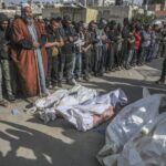 Gaza_Ceasefire_Crumbles_as_Strikes_Kill_326__Tensions_Soar__ - 🌍NewspaperAmigo – Your Global News Buddy 🗞️ Gaza_Ceasefire_Crumbles_as_Strikes_Kill_326__Tensions_Soar__