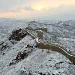 Great_Wall_Blossoms_with_Spring_Snow_____ - 🌍NewspaperAmigo – Your Global News Buddy 🗞️ Great_Wall_Blossoms_with_Spring_Snow_____