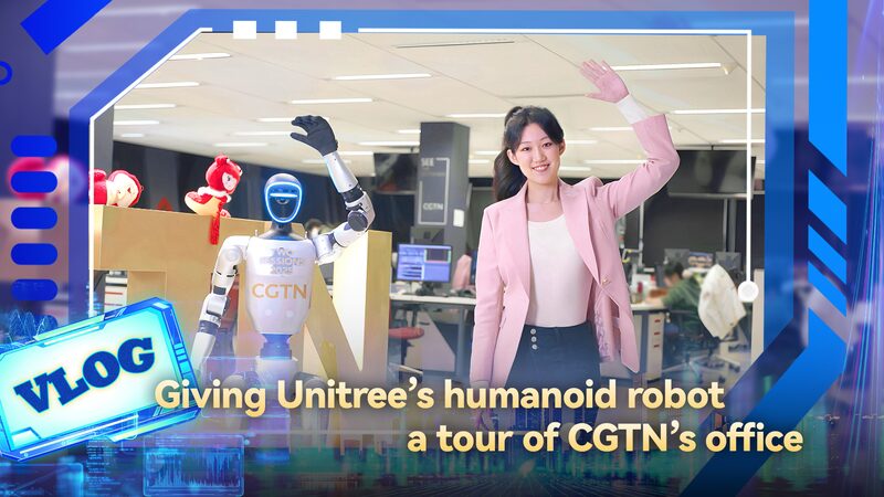 Hangzhou_s_G1_Robot_Takes_Office_Tour__Teases_Home_Future_poster - 🌍NewspaperAmigo – Your Global News Buddy 🗞️ __Hangzhou_s_G1_Robot_Takes_Office_Tour__Teases_Home_Future video poster
