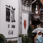 LMGV02DM72ISM1HWD318 - 🌍NewspaperAmigo – Your Global News Buddy 🗞️ Lijiang's Spring Magic: Blooms & Lantern Nights 🌸🏮