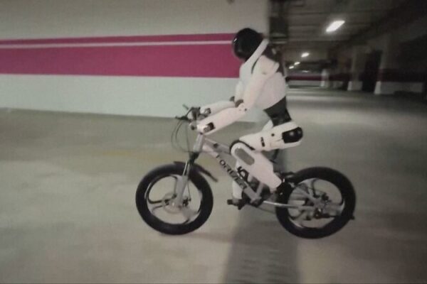 🚲 Meet China’s New Humanoid Robot: Bikes, Sews, and Balances Like a Pro! 🌟 __Meet_China_s_New_Humanoid_Robot__Bikes__Sews__and_Balances_Like_a_Pro___ video poster